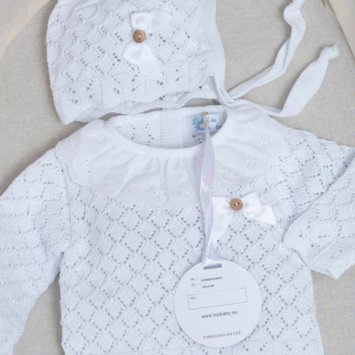 Conjunto blanco de polaina con capucha