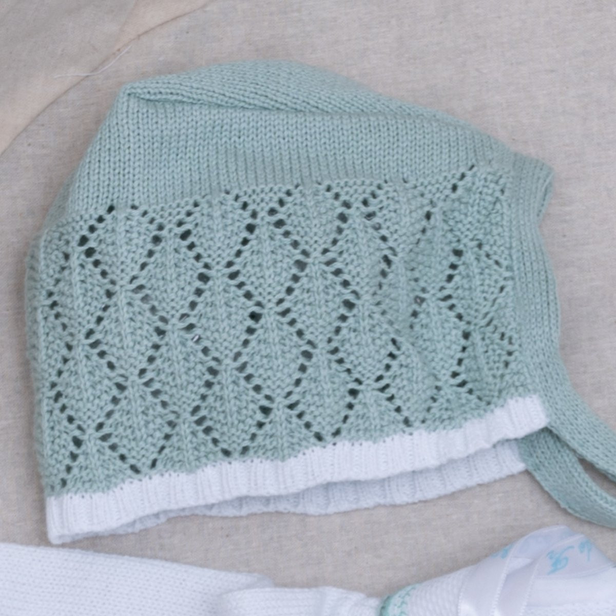 Conjunto de pelele verde con capota